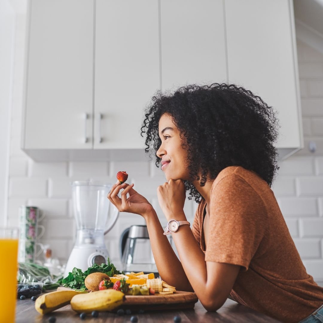 woman eating fruit