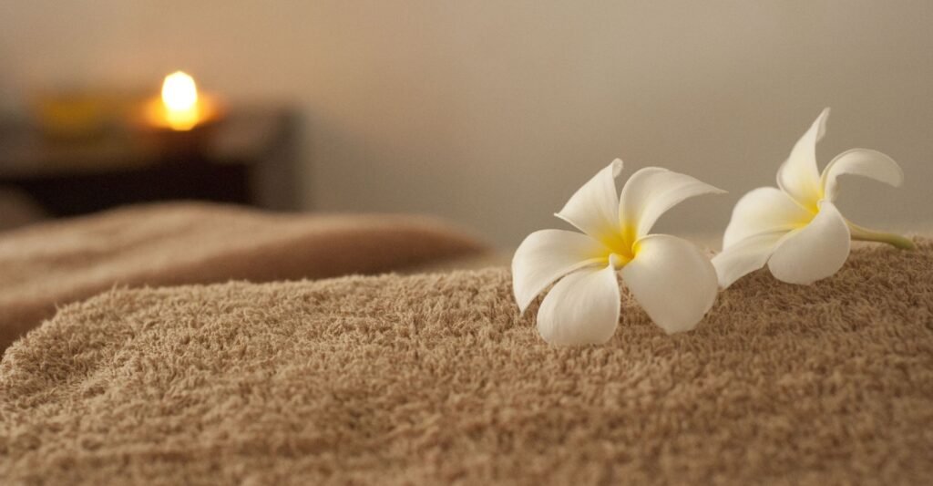 towel with flower and candle