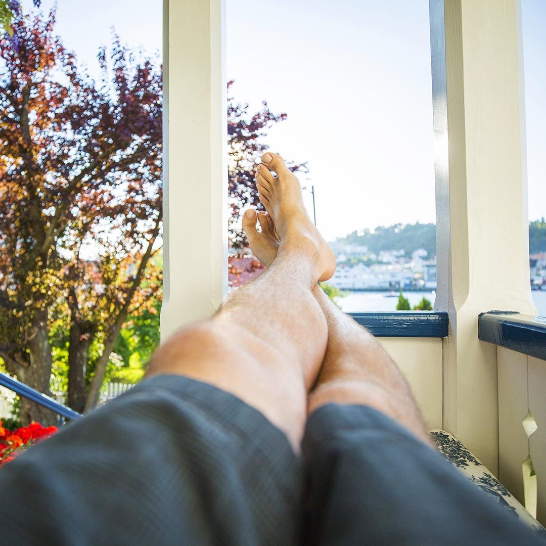 Man relaxing with his feet up