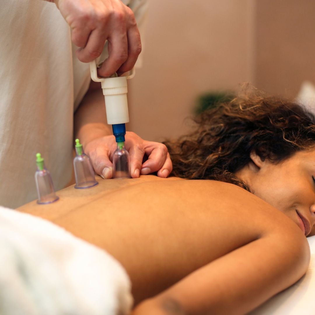 Woman relaxing with cupping