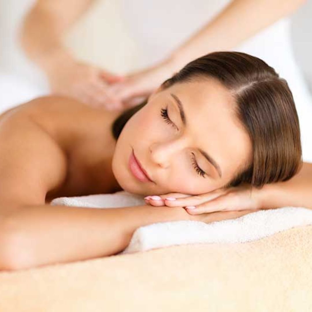 relaxed woman getting massage